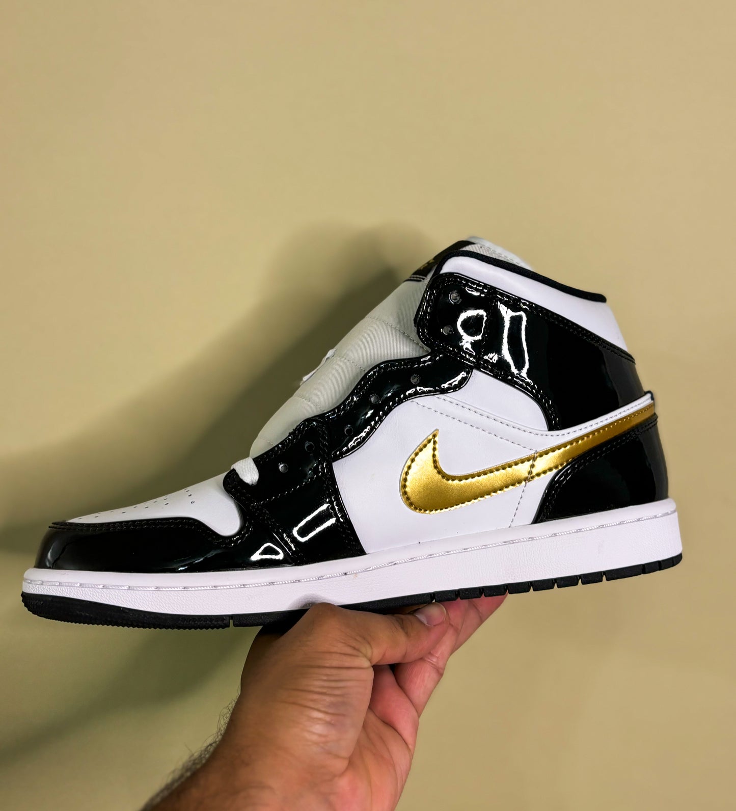 Jordan 1 Mid "Patent Black White Gold"